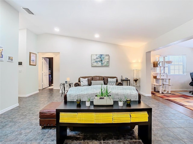 bedroom featuring lofted ceiling