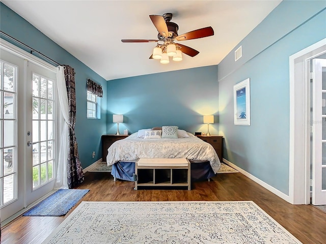 bedroom with french doors, access to exterior, ceiling fan, and dark hardwood / wood-style flooring