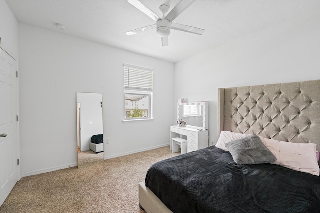 bedroom with light carpet and ceiling fan