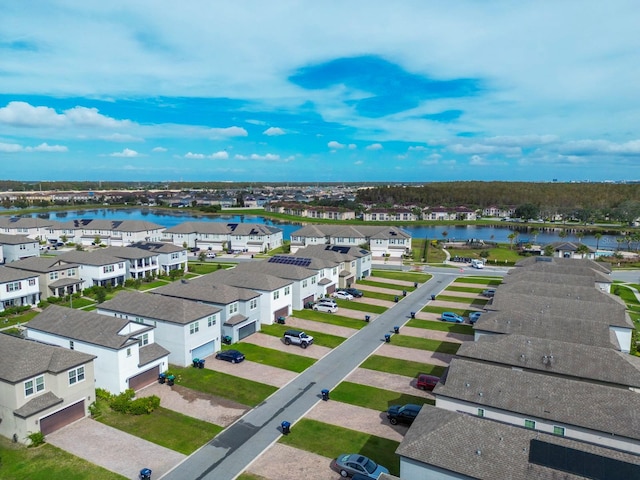 drone / aerial view featuring a water view