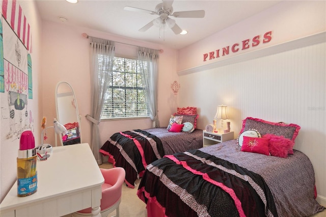 carpeted bedroom featuring ceiling fan