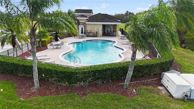 view of pool featuring a patio