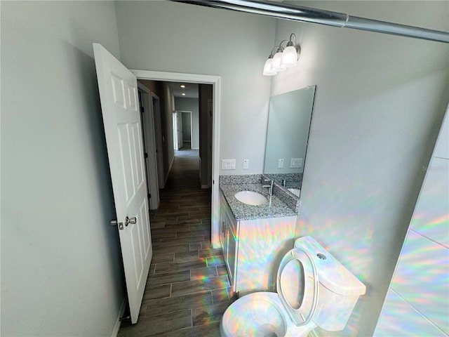 bathroom with vanity and hardwood / wood-style flooring