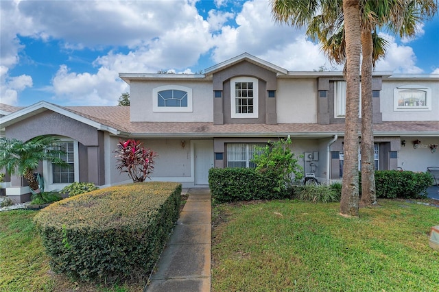 1220 Garden Isle Ct, Orlando, FL 32824 - view of front of property with stucco siding and a front yard