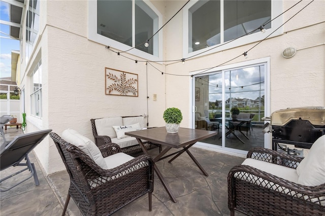 view of patio featuring area for grilling and an outdoor hangout area