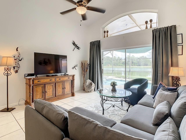 tiled living room with ceiling fan