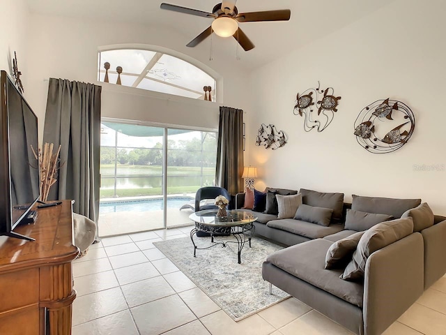 tiled living room with ceiling fan