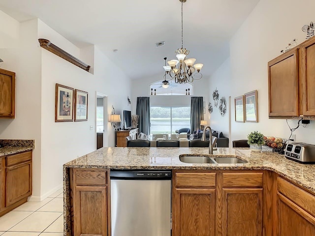 kitchen with stainless steel dishwasher, sink, light tile patterned floors, a notable chandelier, and lofted ceiling