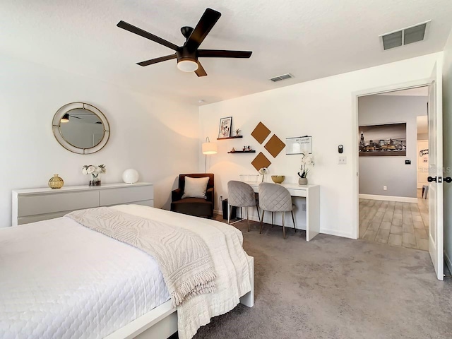 carpeted bedroom with ceiling fan