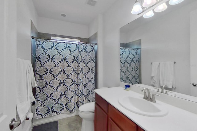 full bathroom featuring tile patterned flooring, vanity, toilet, and shower / tub combo