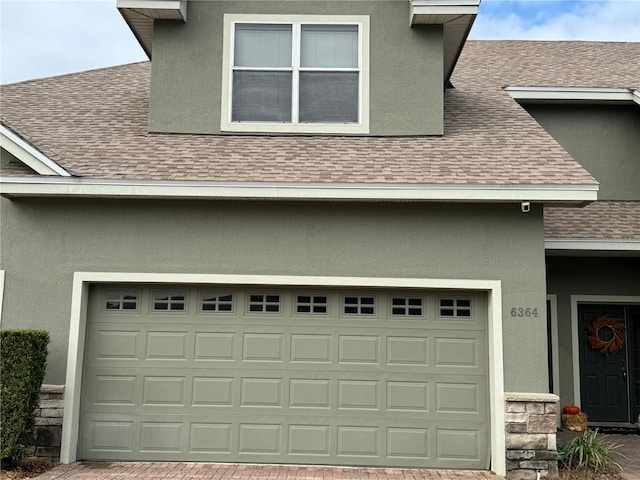 view of property exterior featuring a garage