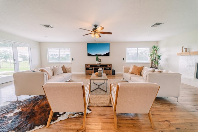 4121 Albritton Rd, Saint Cloud, FL 34772 - living room featuring healthy amount of natural light, light wood-style floors, and ceiling fan