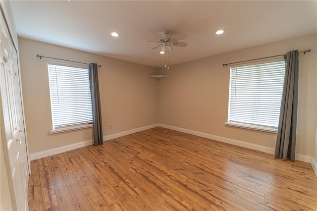4121 Albritton Rd, Saint Cloud, FL 34772 - spare room featuring ceiling fan, light wood-style flooring, baseboards, recessed lighting, and a textured ceiling
