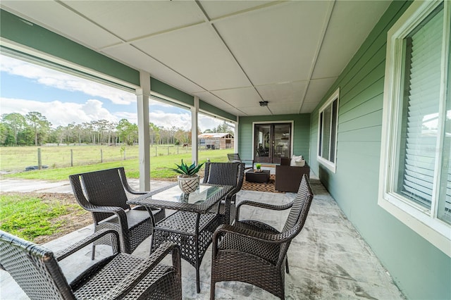4121 Albritton Rd, Saint Cloud, FL 34772 - sunroom with an outdoor living space and healthy amount of natural light