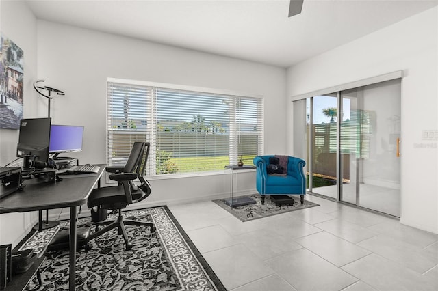 office area featuring light tile patterned flooring and a healthy amount of sunlight