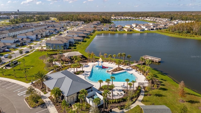 birds eye view of property featuring a water view