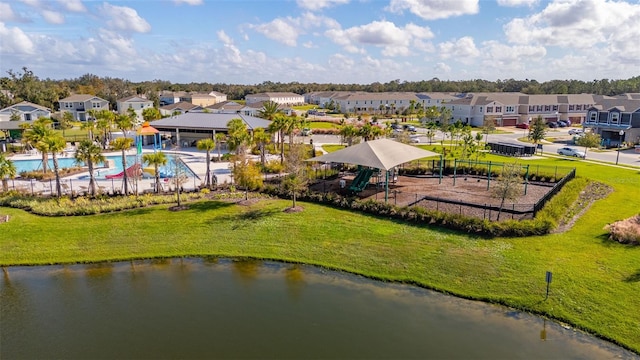 birds eye view of property featuring a water view