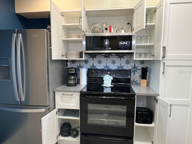 kitchen featuring tasteful backsplash, white cabinetry, and stainless steel appliances