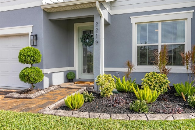 property entrance featuring a garage