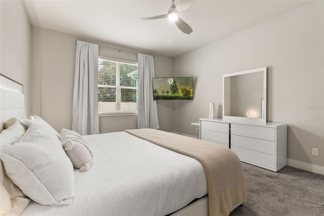 bedroom with ceiling fan and light carpet