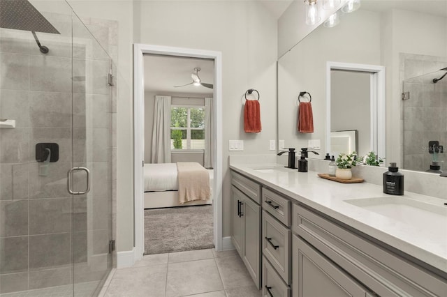 bathroom featuring vanity, walk in shower, and tile patterned floors