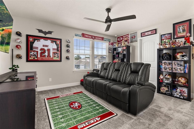 living room with carpet, ceiling fan, and a textured ceiling