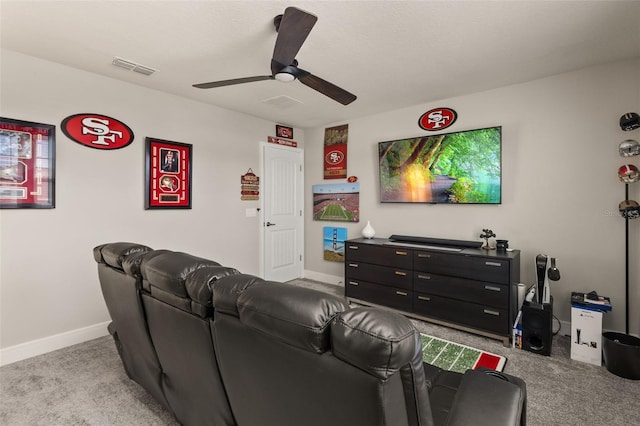 living room featuring ceiling fan and light colored carpet