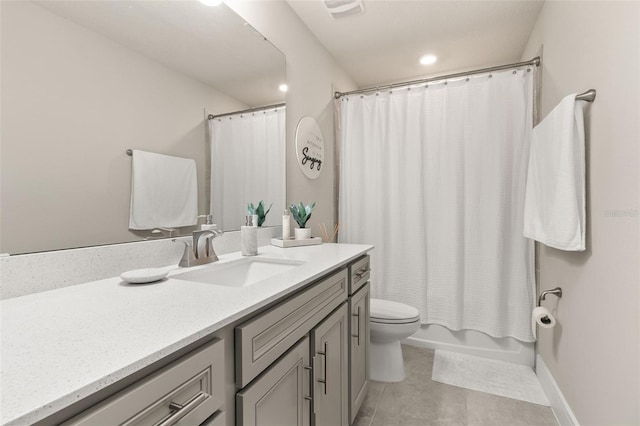 full bathroom with vanity, toilet, shower / bath combo, and tile patterned flooring