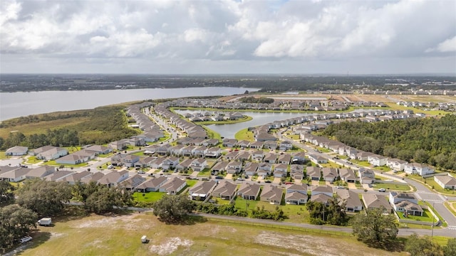 bird's eye view with a water view