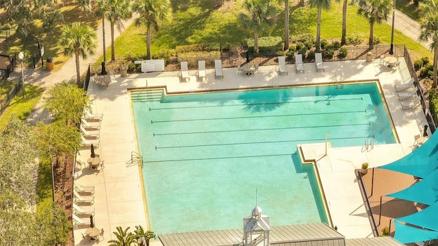 view of swimming pool featuring a patio area