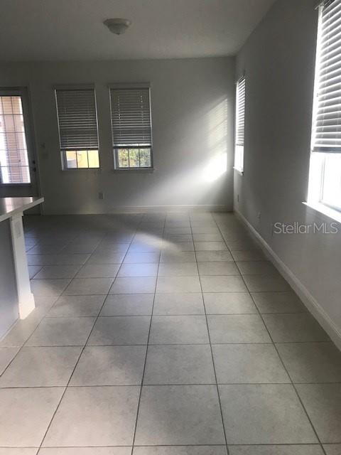 view of tiled spare room