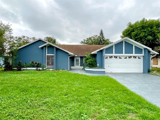 ranch-style house featuring a garage and a front yard