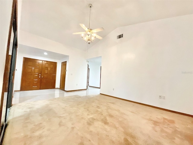 unfurnished room featuring ceiling fan, light carpet, and high vaulted ceiling