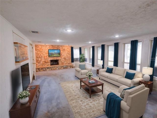 living room with carpet, a textured ceiling, and a fireplace