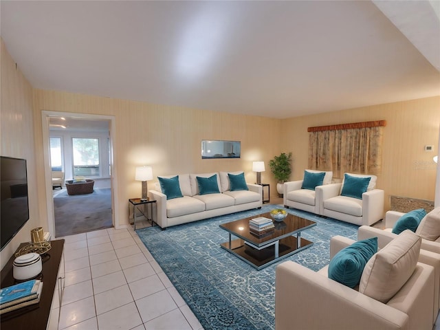 living room with tile patterned flooring