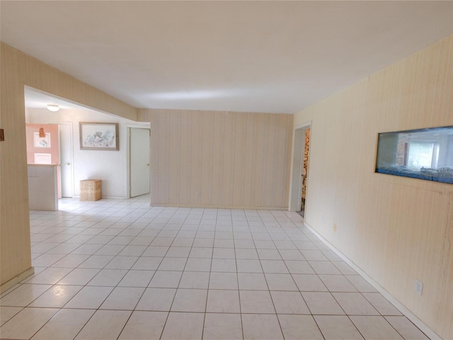 unfurnished room featuring light tile patterned floors