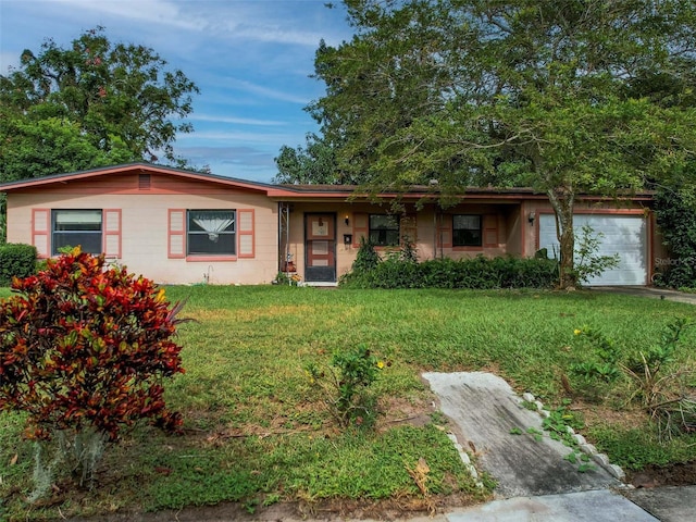 single story home with a garage and a front yard