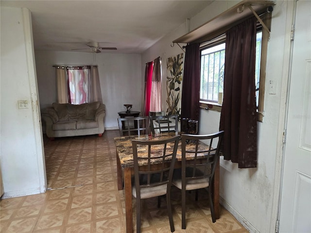 dining room with ceiling fan