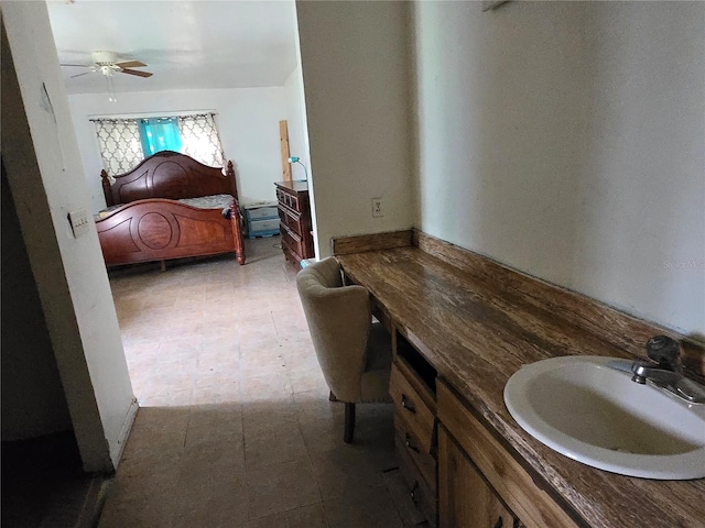 bathroom featuring sink and ceiling fan