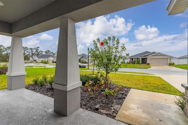 view of patio / terrace with a garage