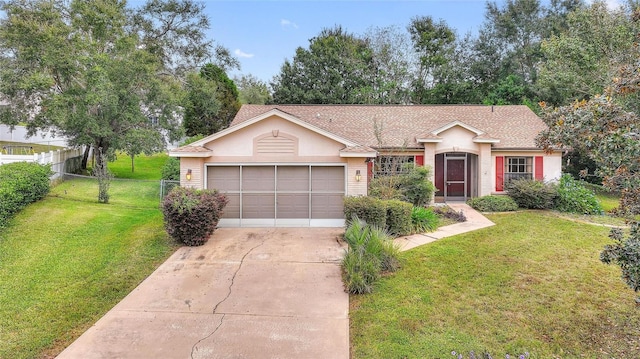 ranch-style home with a garage and a front lawn