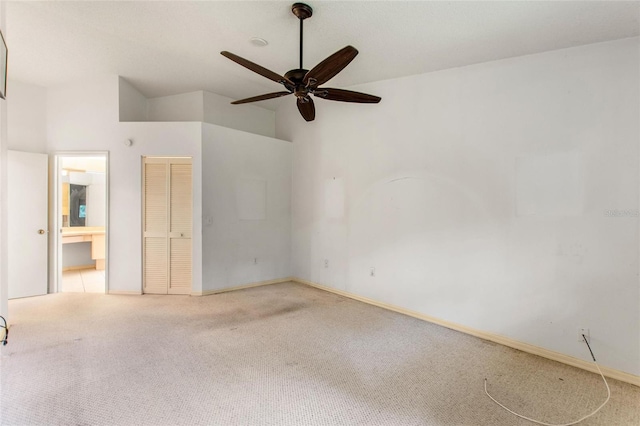 empty room with light carpet and ceiling fan