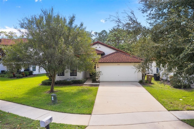 9016 Murano Mews Ct, Kissimmee, FL 34747 - mediterranean / spanish home with a tiled roof, stucco siding, a garage, a front yard, and driveway