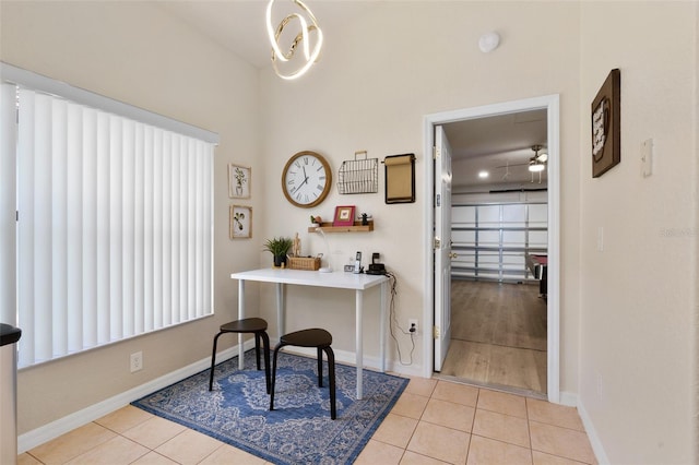 tiled home office with ceiling fan