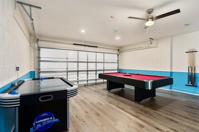 playroom featuring billiards, light hardwood / wood-style flooring, and ceiling fan