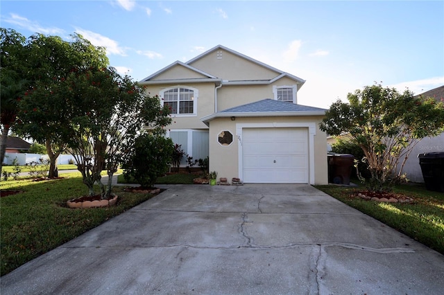 view of property featuring a front lawn