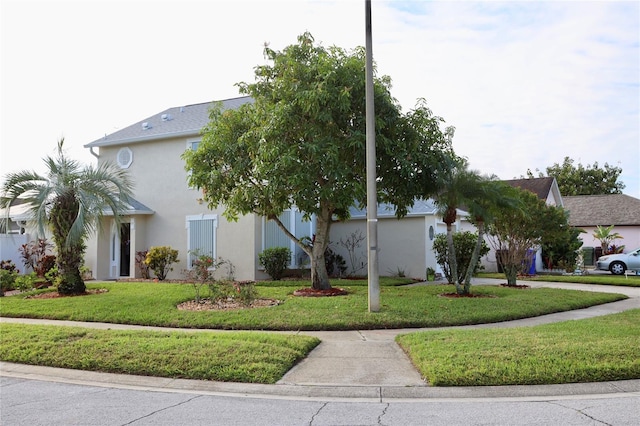 view of front facade with a front lawn