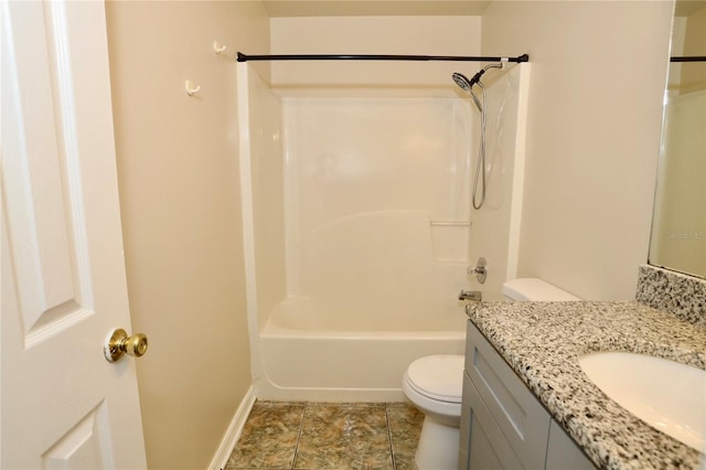 full bathroom featuring vanity, bathing tub / shower combination, and toilet