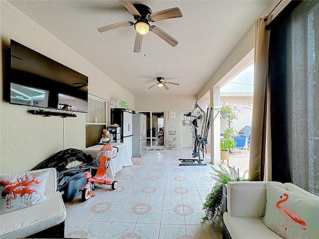 interior space featuring ceiling fan