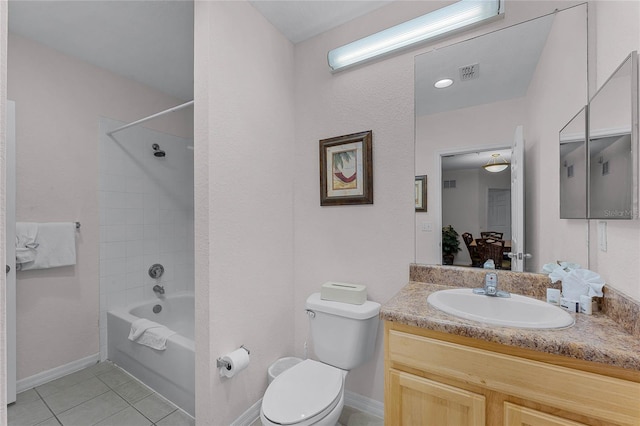 full bathroom with toilet, vanity, tile patterned floors, and  shower combination